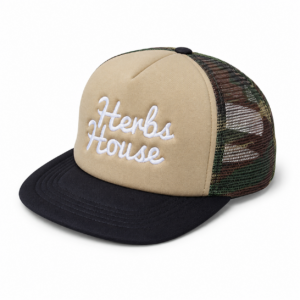 Tan and black Herbs House trucker hat with camo mesh